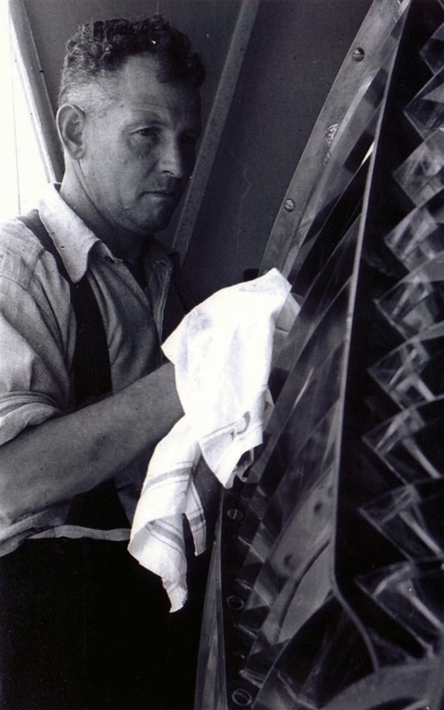 Charles Emmens cleaning the optic (1948)